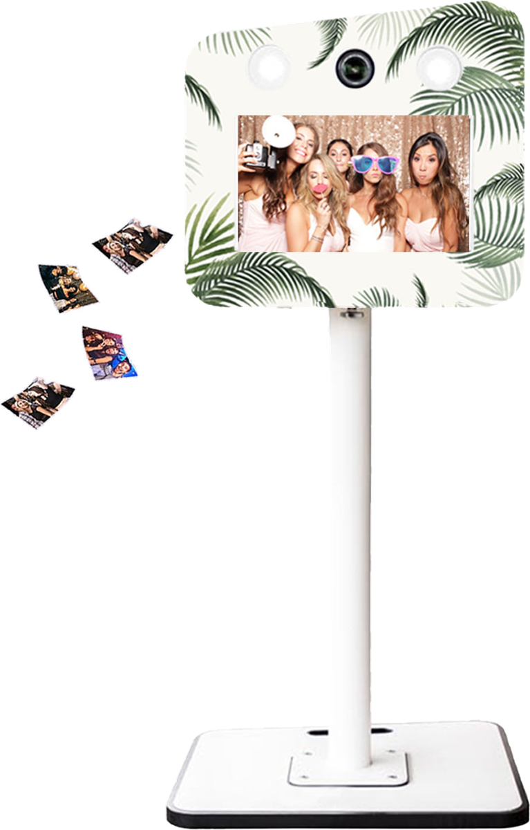 White photo booth with palm-leaf design on a white background